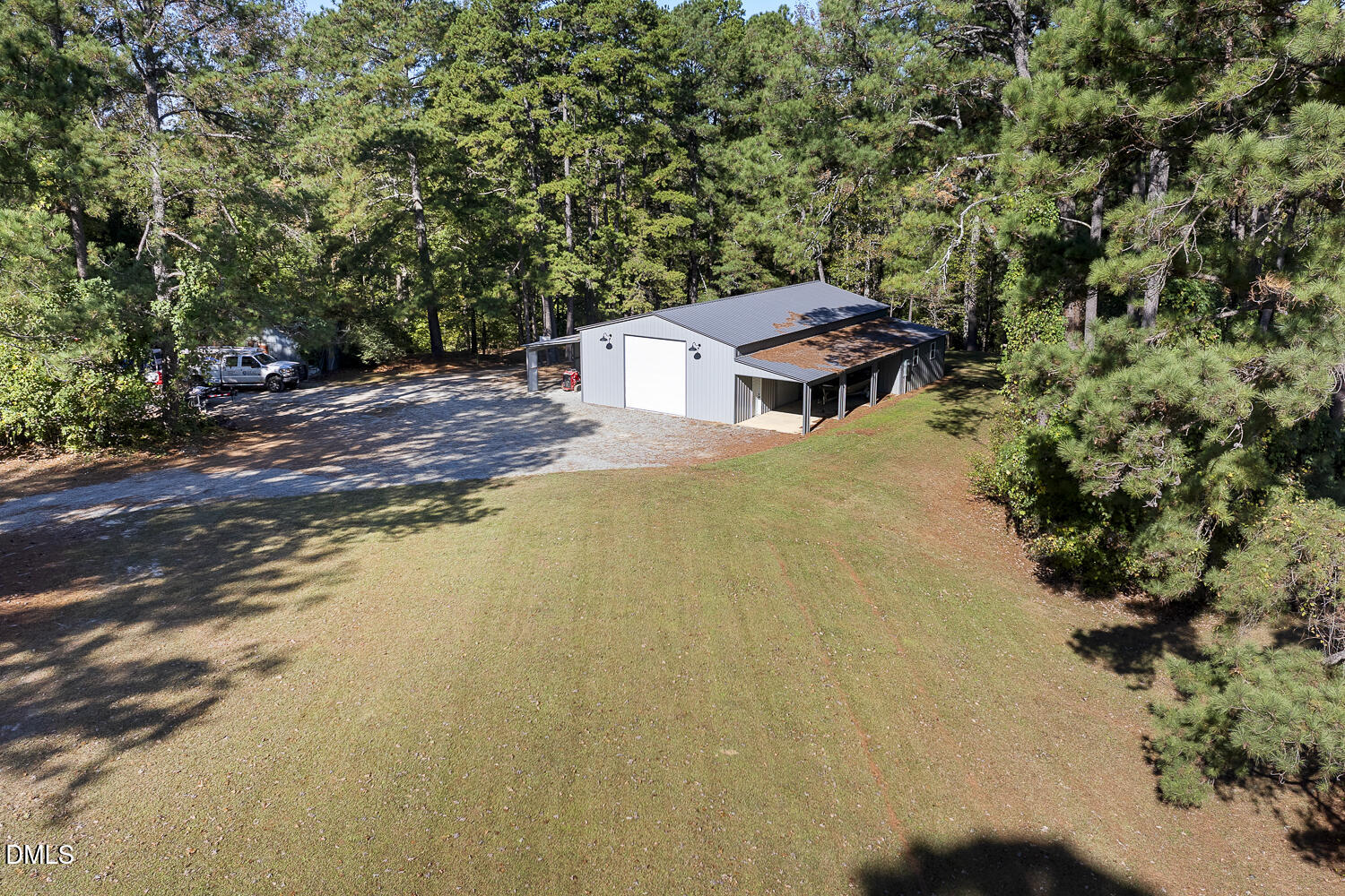 273 Wells Lane Angier, NC 27501 - Photo 5 of 52 a view of a big yard with large trees