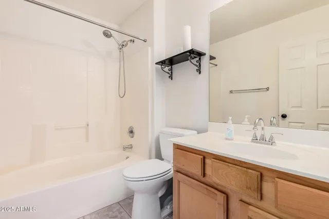 a bathroom with a sink a toilet and a bathtub