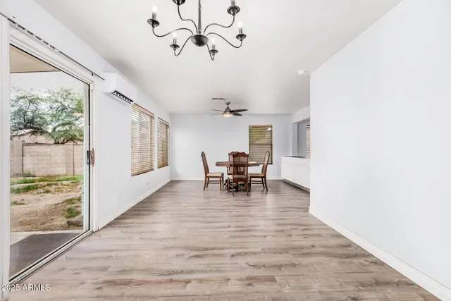 a view of a livingroom with furniture and window