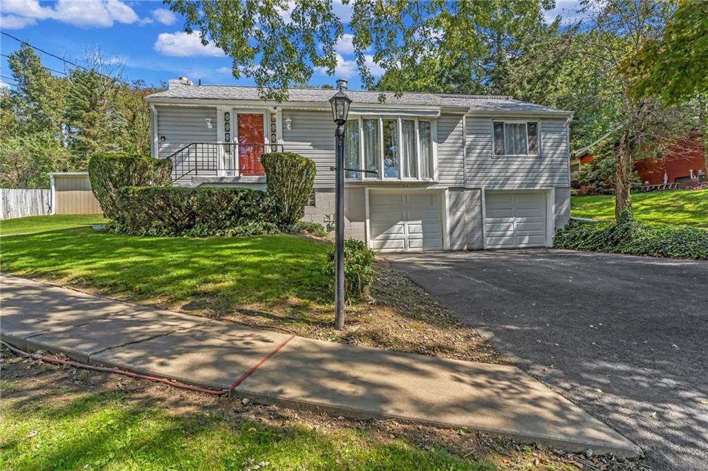 203 Beech Road Pittsburgh, PA 15239 - Photo 21 of 21 a view of a house with a yard