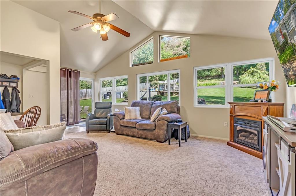 203 Beech Road Pittsburgh, PA 15239 - Photo 8 of 21 a living room with furniture and a large window