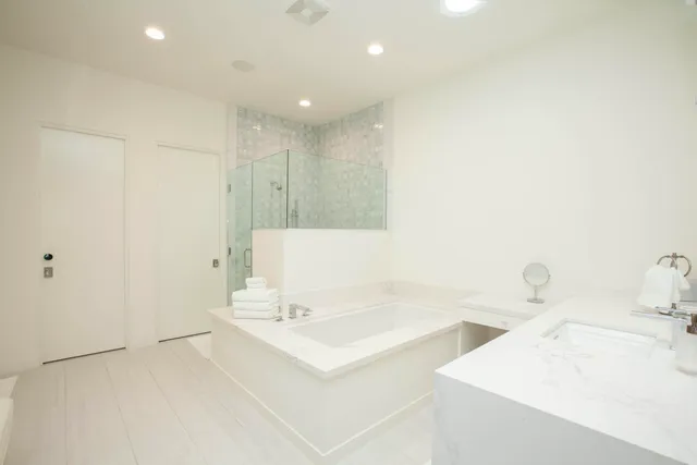 a bathroom with a sink and a bathtub