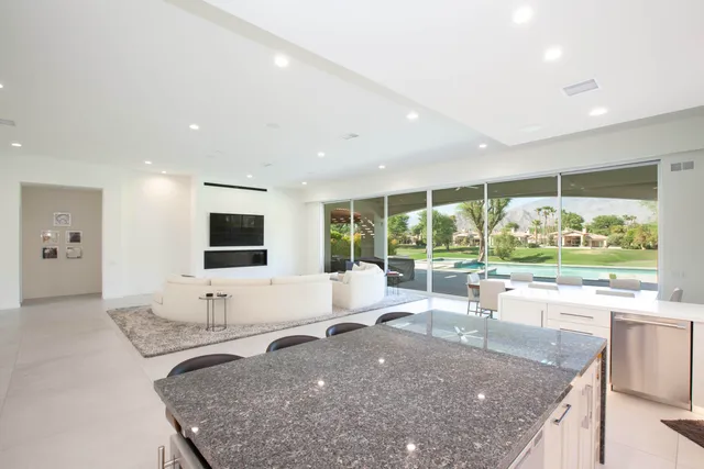 a large living room with a large window