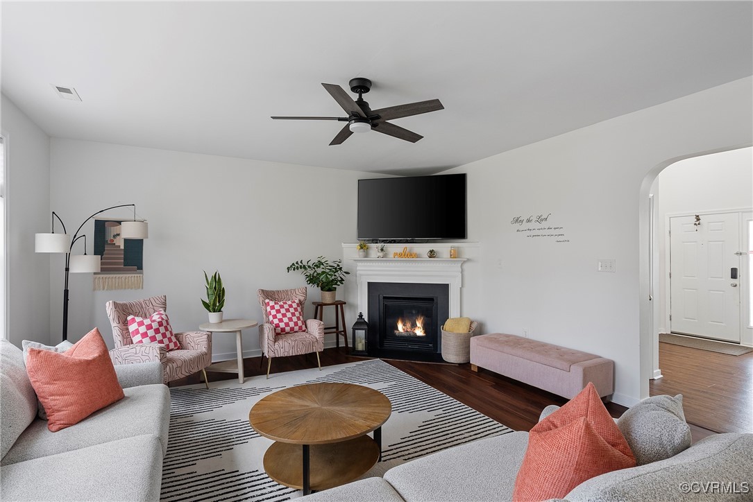 2112 Tomahawk Ridge Place Midlothian, VA 23112 - Photo 12 of 50 Living room featuring baseboards, ceiling fan, woo