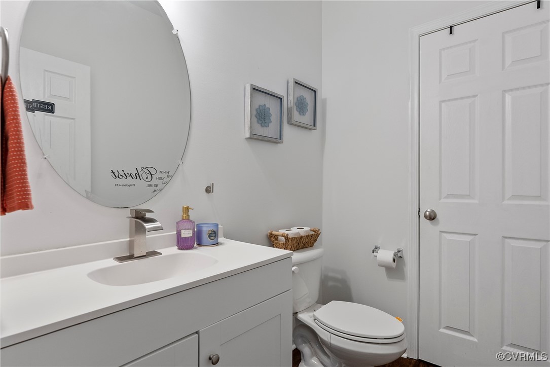 2112 Tomahawk Ridge Place Midlothian, VA 23112 - Photo 25 of 50 Half bathroom featuring toilet and vanity
