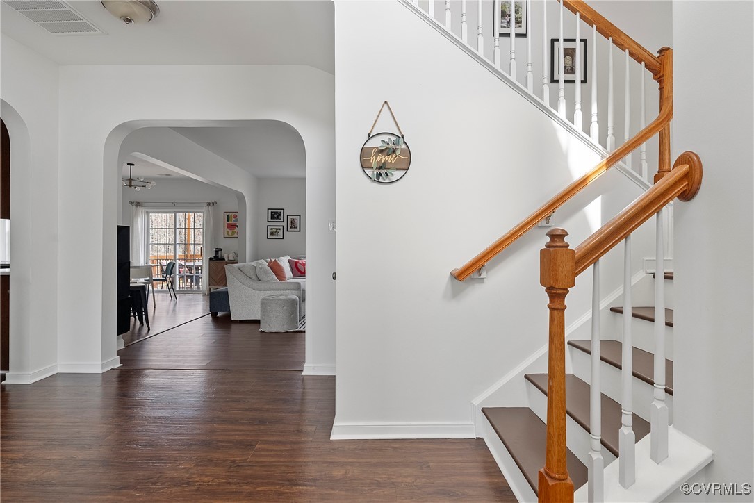 2112 Tomahawk Ridge Place Midlothian, VA 23112 - Photo 4 of 50 Staircase with arched walkways, baseboards, visibl