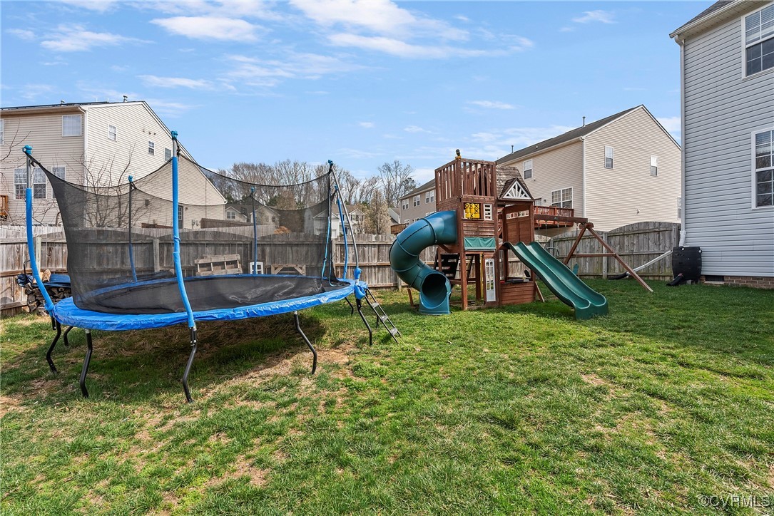 2112 Tomahawk Ridge Place Midlothian, VA 23112 - Photo 47 of 50 View of jungle gym with a trampoline, a fenced bac