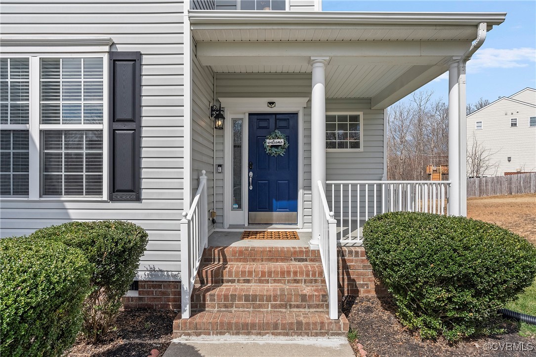 2112 Tomahawk Ridge Place Midlothian, VA 23112 - Photo 50 of 50 View of exterior entry featuring a porch