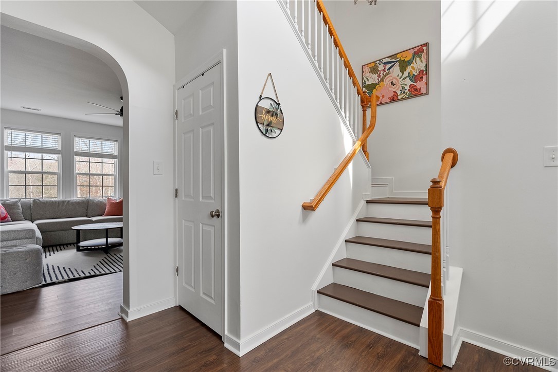 2112 Tomahawk Ridge Place Midlothian, VA 23112 - Photo 5 of 50 Staircase featuring a ceiling fan, arched walkways