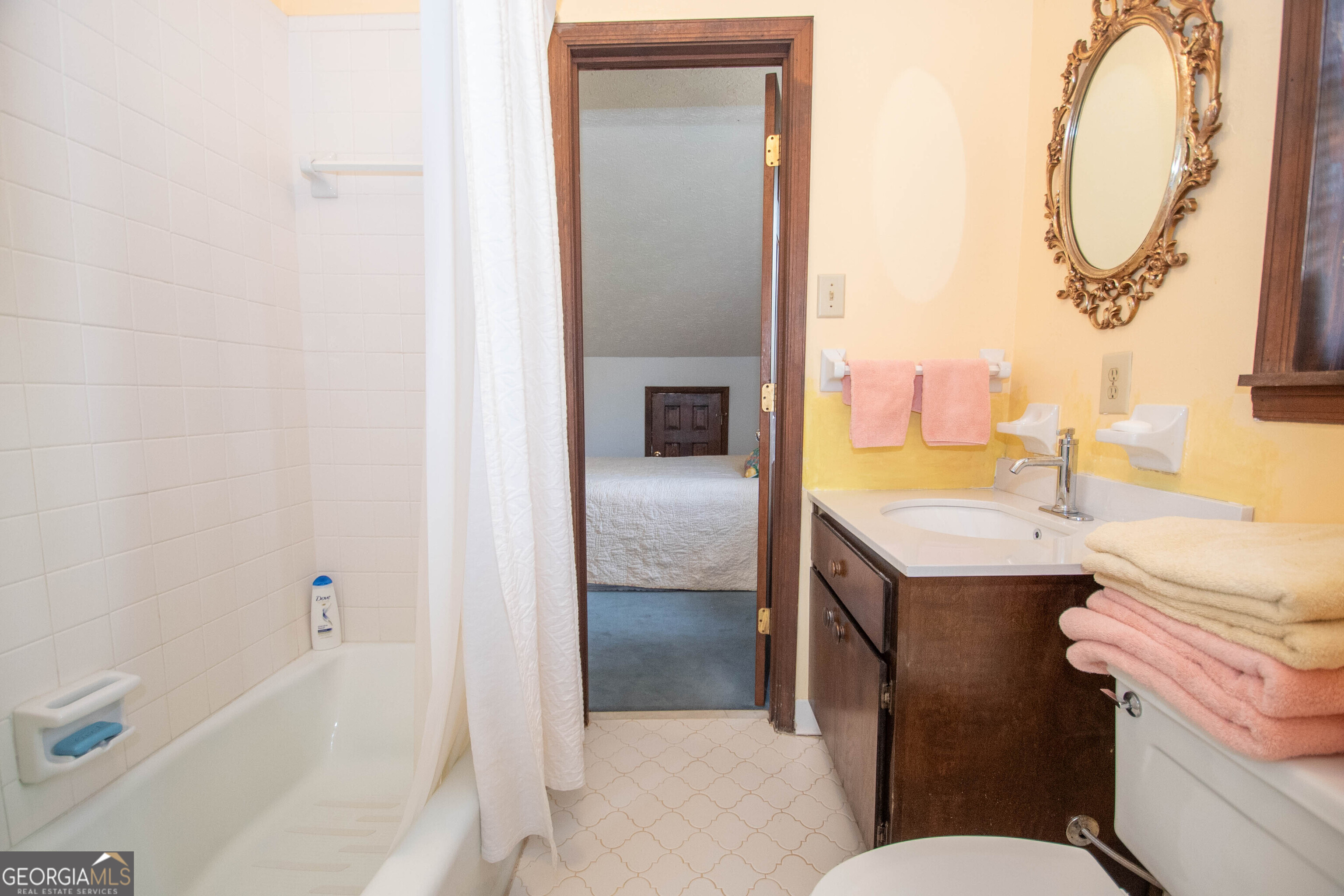 151 Evans Road Milner, GA 30257 - Photo 21 of 60 a bathroom with a granite countertop sink toilet and shower