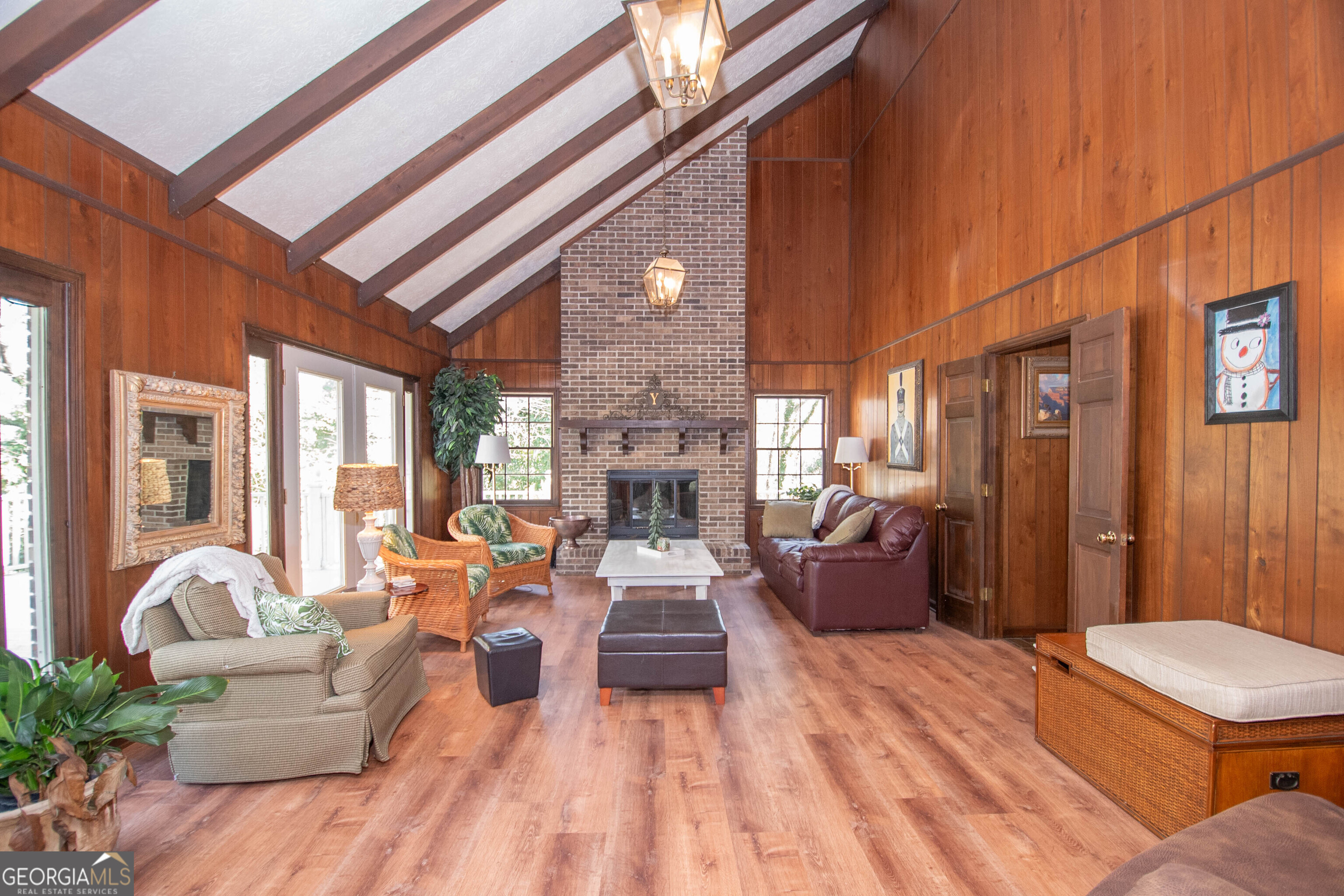 151 Evans Road Milner, GA 30257 - Photo 3 of 60 a living room with furniture and a fireplace