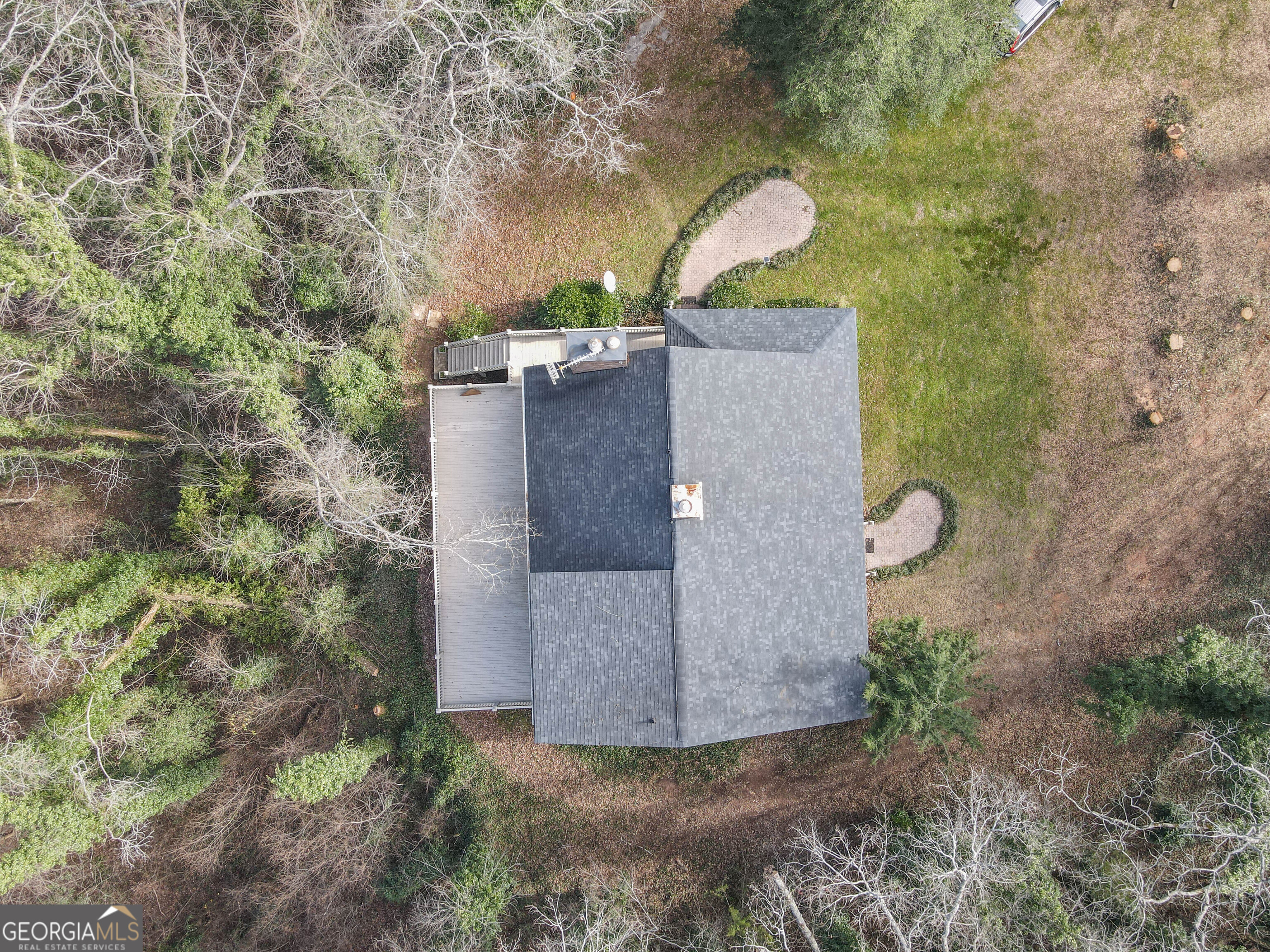 151 Evans Road Milner, GA 30257 - Photo 35 of 60 an aerial view of a house with a yard and large tree