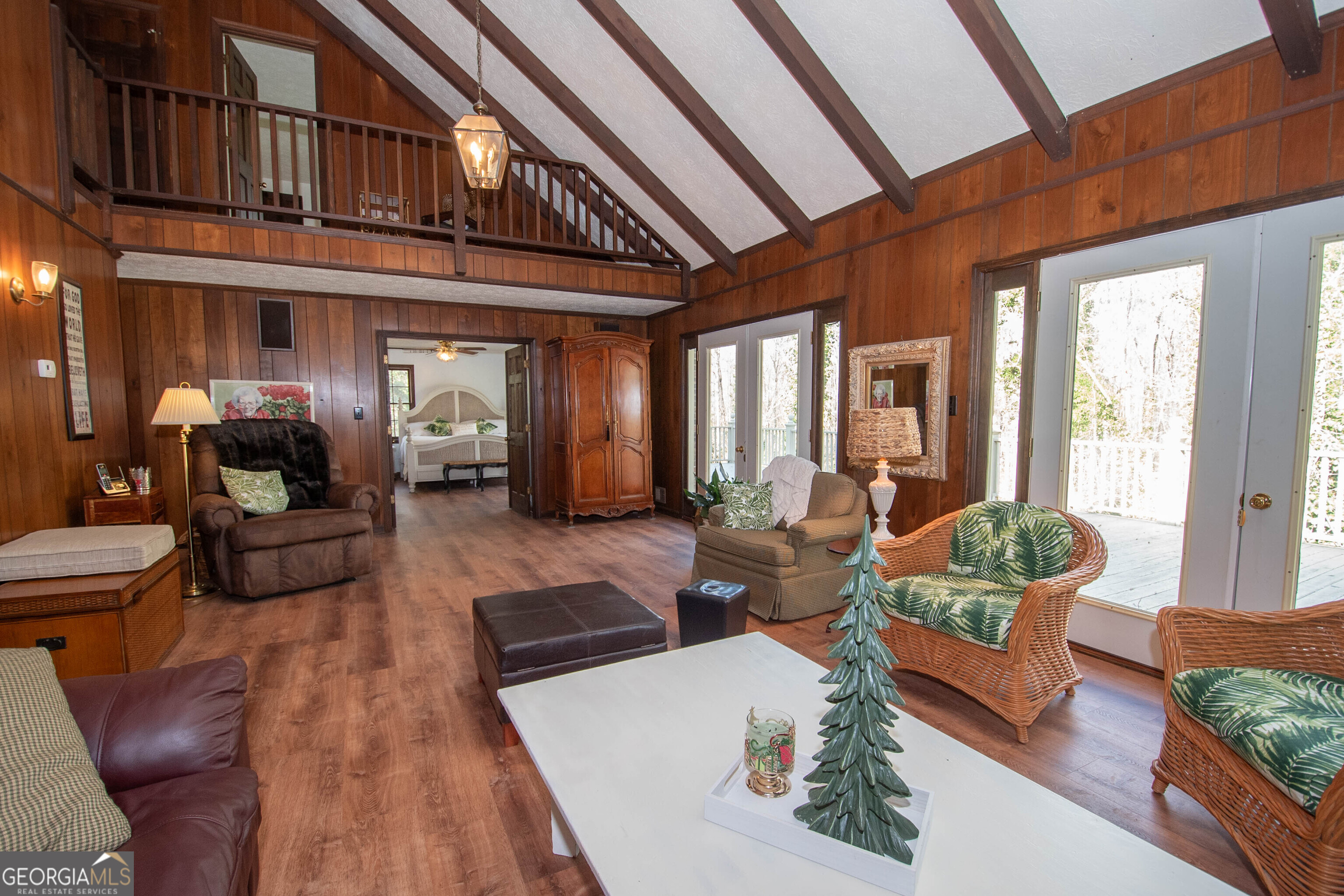 151 Evans Road Milner, GA 30257 - Photo 46 of 60 a living room with furniture fireplace and a large window