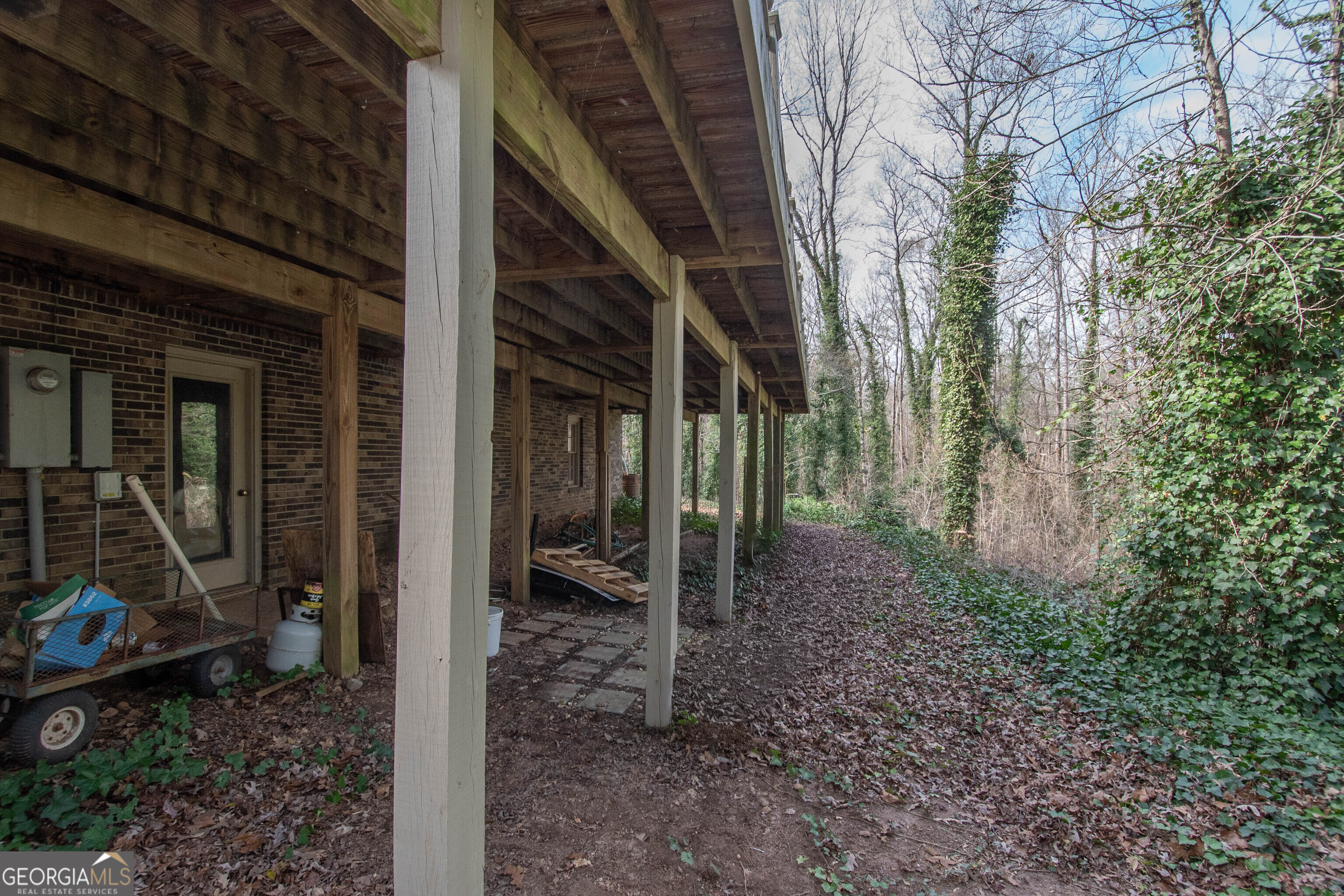 151 Evans Road Milner, GA 30257 - Photo 53 of 60 a view of a pathway of a house