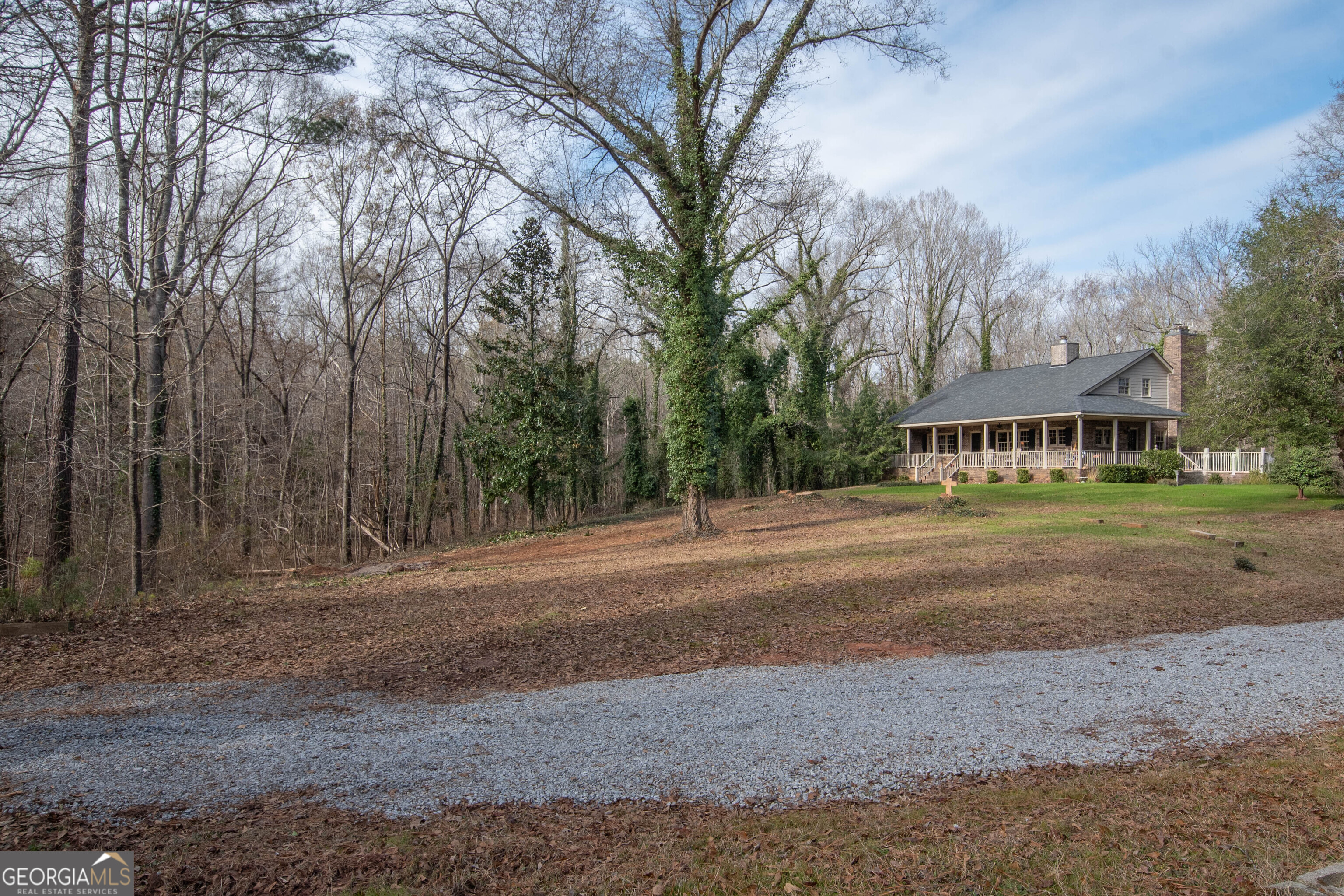 151 Evans Road Milner, GA 30257 - Photo 59 of 60 a view of house with outdoor space and street view