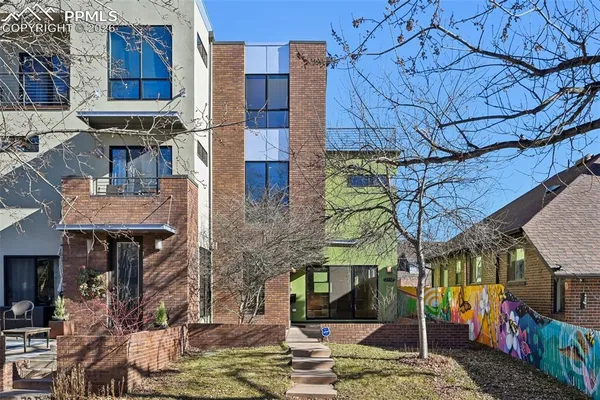 a view of street with sitting area