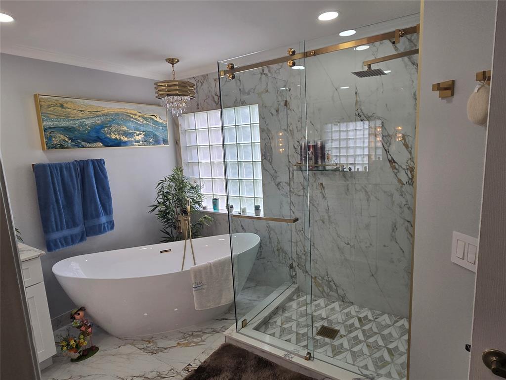 22112 Altona Drive Boca Raton, FL 33428 - Photo 14 of 40 a bathroom with a bathtub and shower