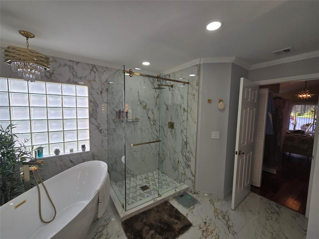 22112 Altona Drive Boca Raton, FL 33428 - Photo 17 of 40 a bathroom with a shower a toilet and sink