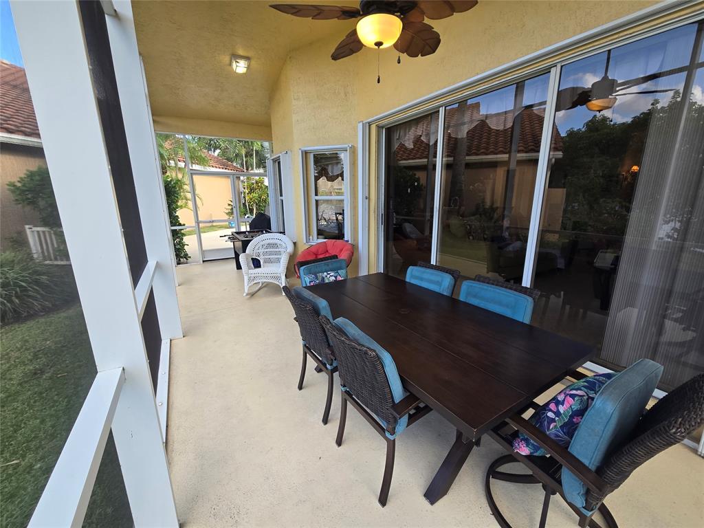 22112 Altona Drive Boca Raton, FL 33428 - Photo 23 of 40 a dining room with furniture and window