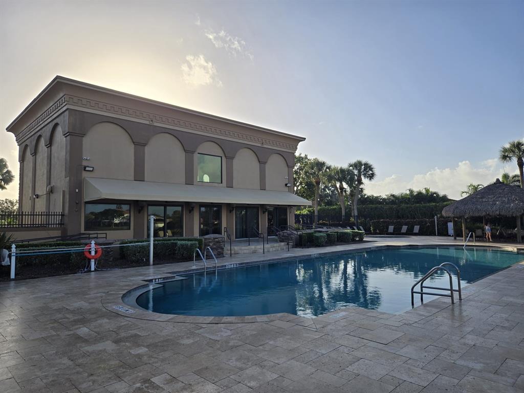 22112 Altona Drive Boca Raton, FL 33428 - Photo 38 of 40 a view of house with swimming pool and furniture