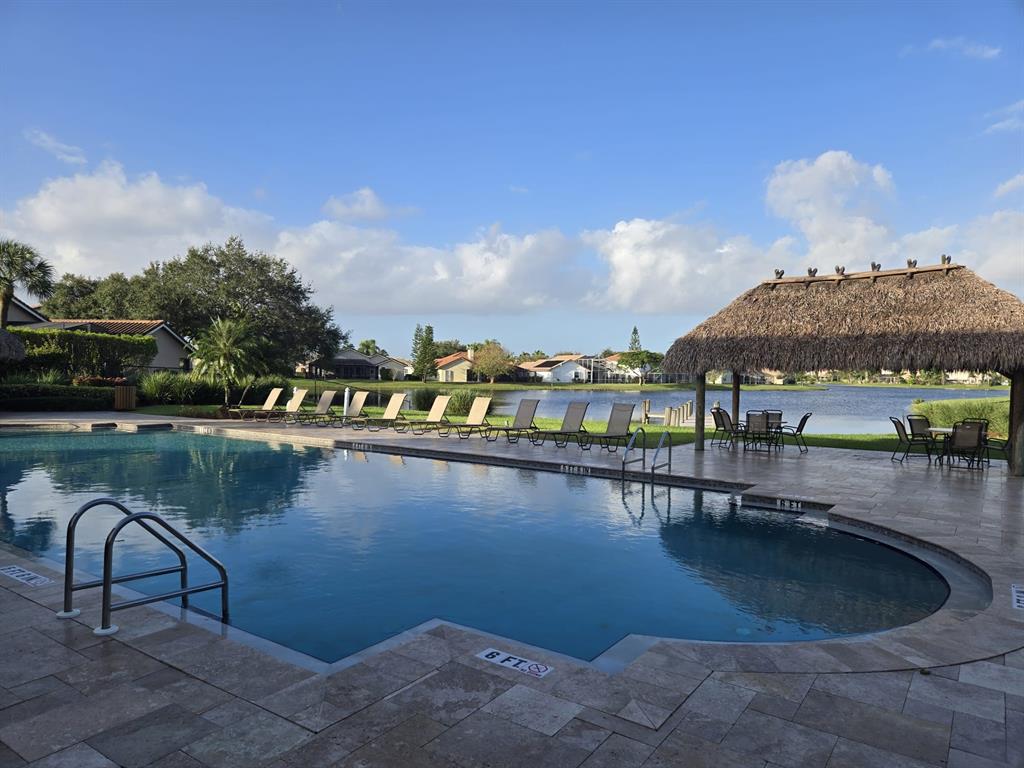 22112 Altona Drive Boca Raton, FL 33428 - Photo 40 of 40 a view of a lake with a house