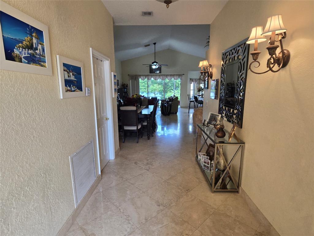 22112 Altona Drive Boca Raton, FL 33428 - Photo 4 of 40 a view of a livingroom with furniture and a window