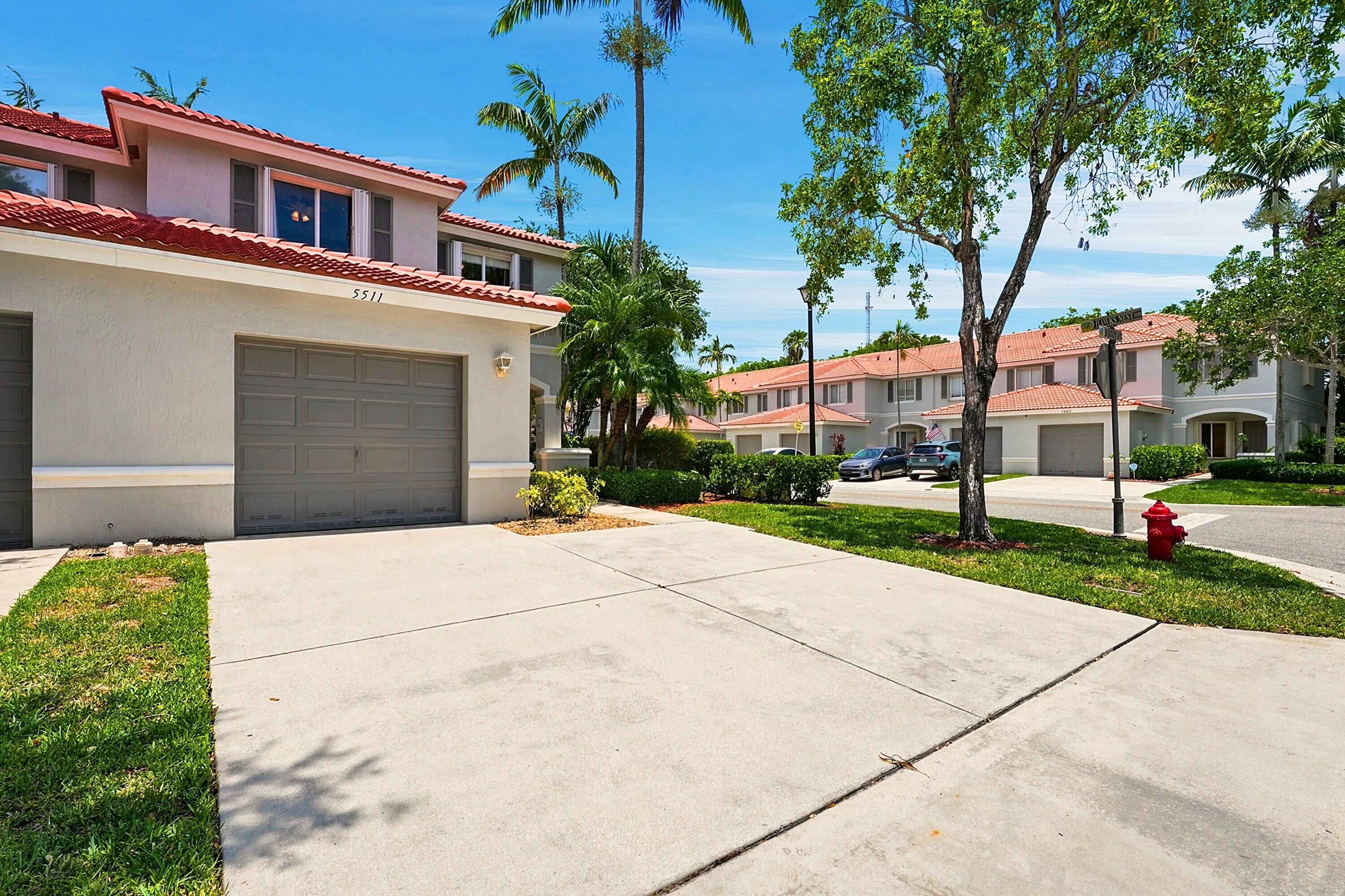 5511 Crossing Rocks Court Riviera Beach, FL 33407 - Photo 3 of 49 04 Outside angeled