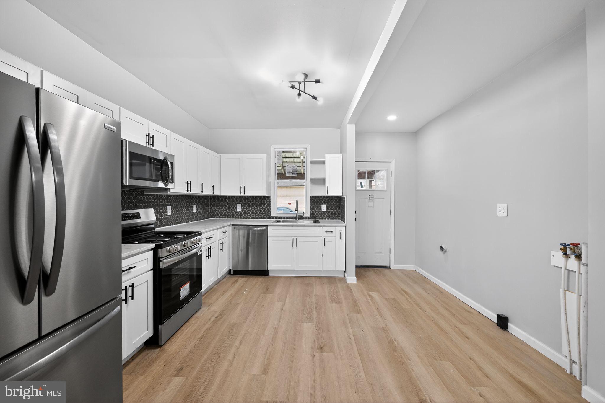1122 Buttonwood Street Lebanon, PA 17046 - Photo 5 of 13 Modern kitchen with sleek finishes.