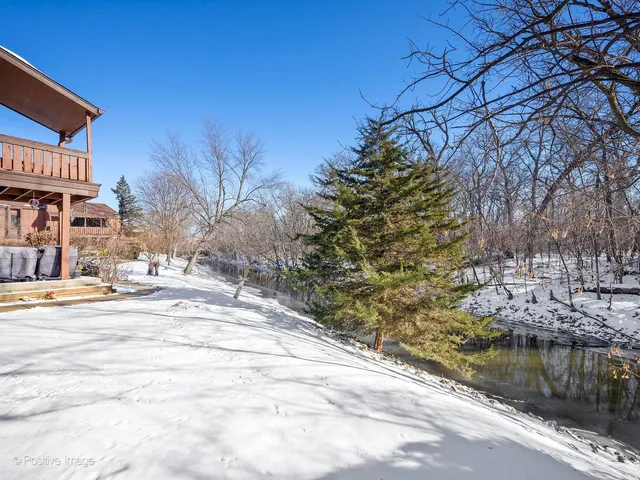 a view of a lake with a building in the background