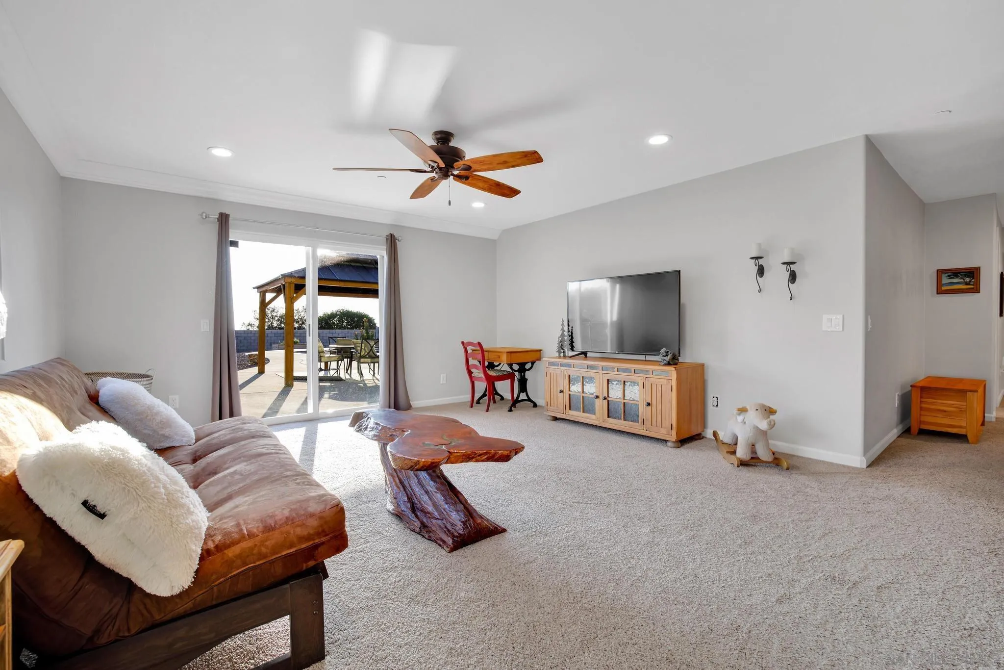 1661 West Winds Ridge Alpine, CA 91901 - Photo 18 of 65 a living room with furniture and a flat screen tv