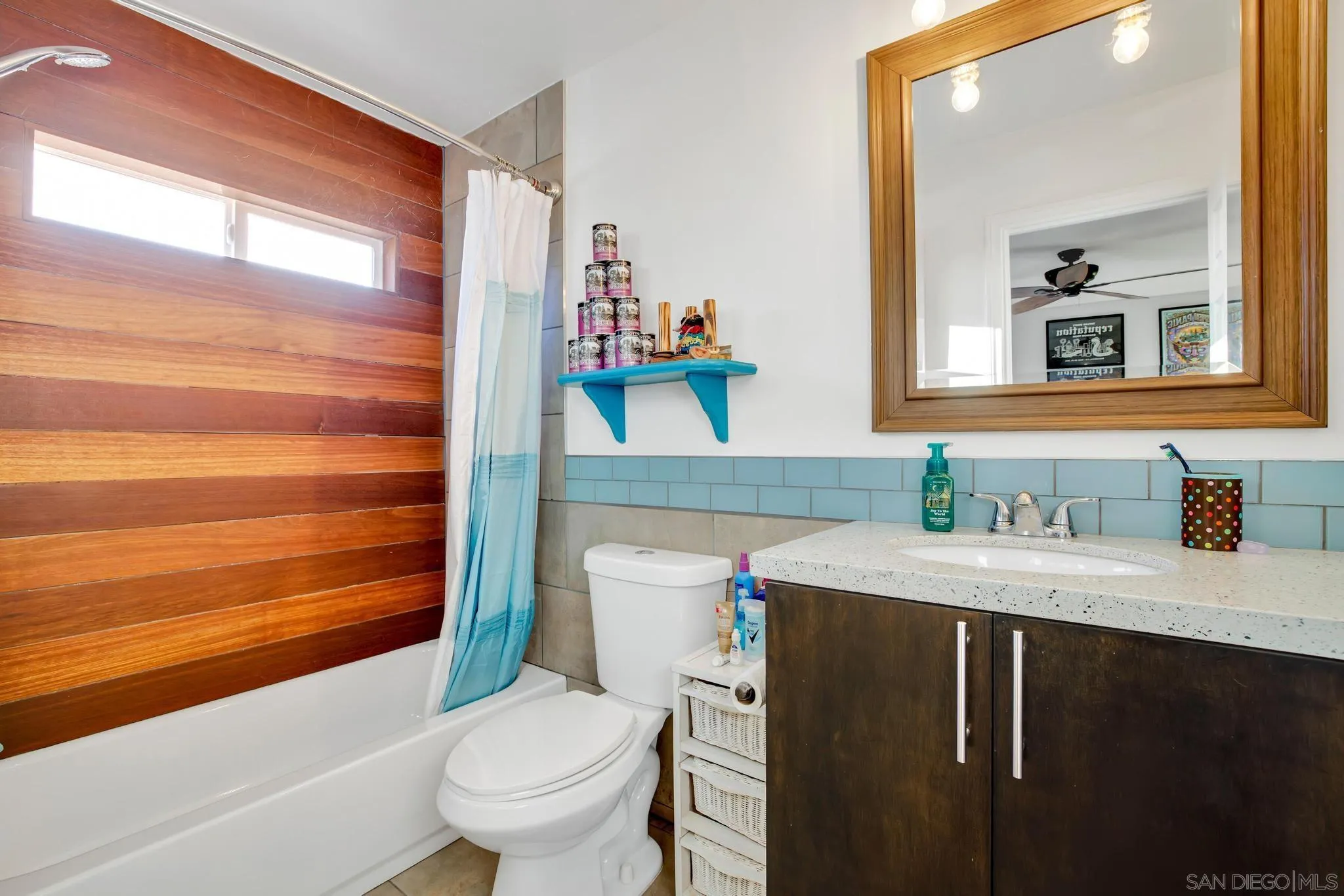 1661 West Winds Ridge Alpine, CA 91901 - Photo 19 of 65 a bathroom with a sink a toilet and shower