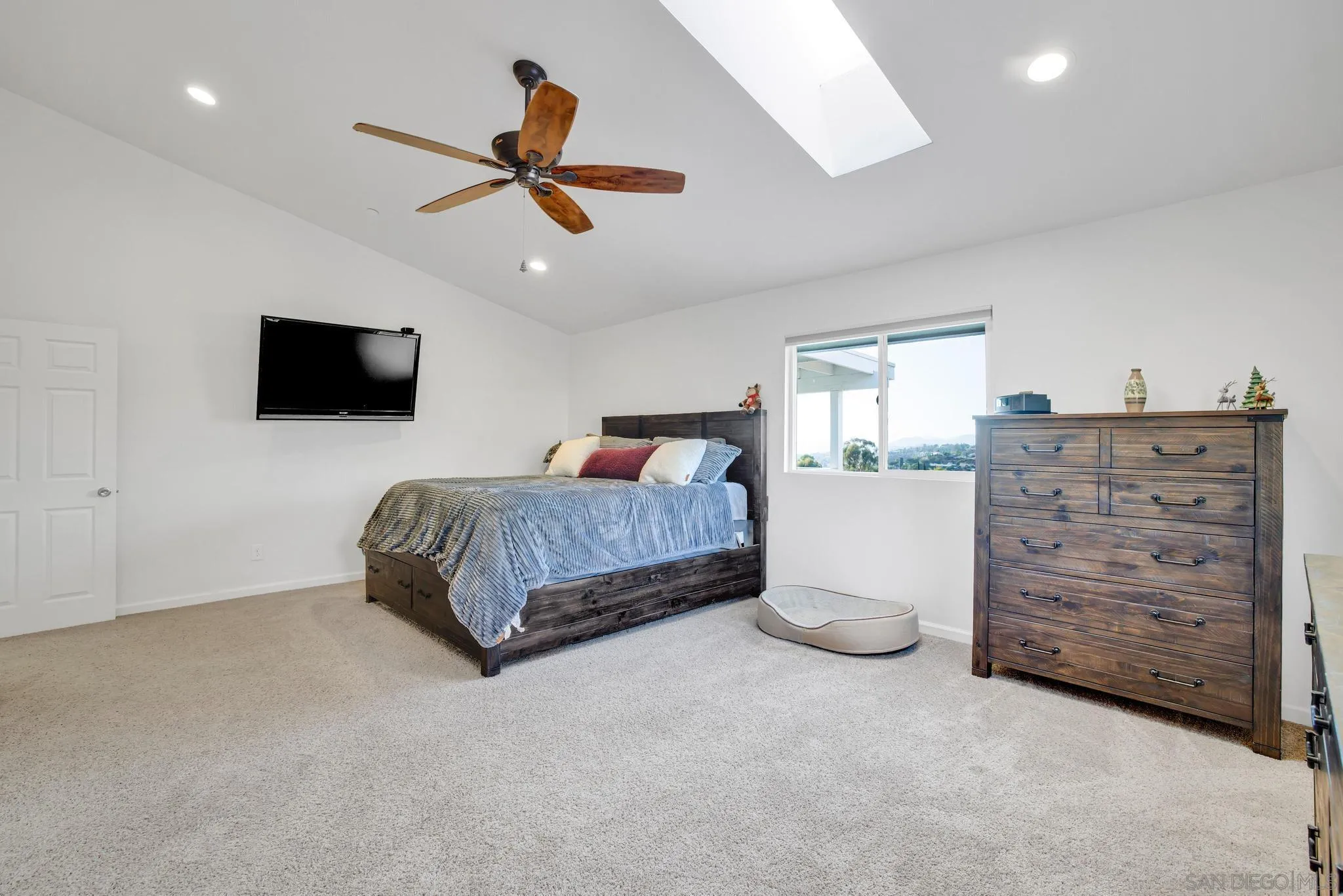 1661 West Winds Ridge Alpine, CA 91901 - Photo 21 of 65 a bedroom with a bed and a flat screen tv
