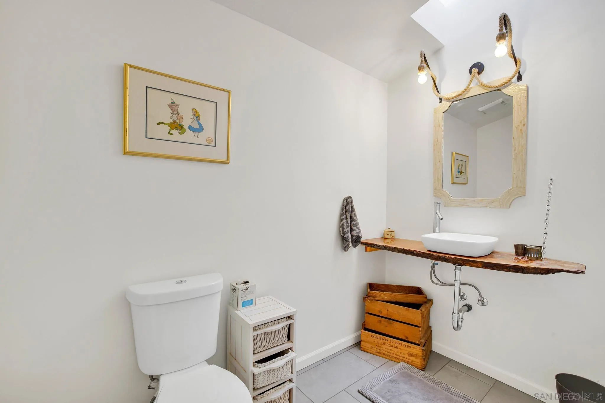 1661 West Winds Ridge Alpine, CA 91901 - Photo 26 of 65 a bathroom with a toilet a sink and mirror