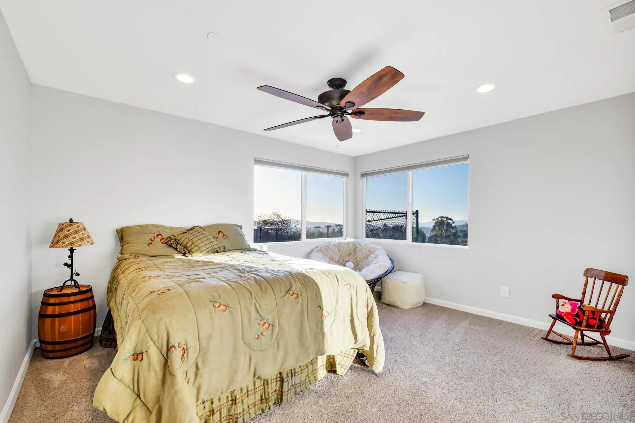 1661 West Winds Ridge Alpine, CA 91901 - Photo 32 of 65 a spacious bedroom with a bed and a chandelier