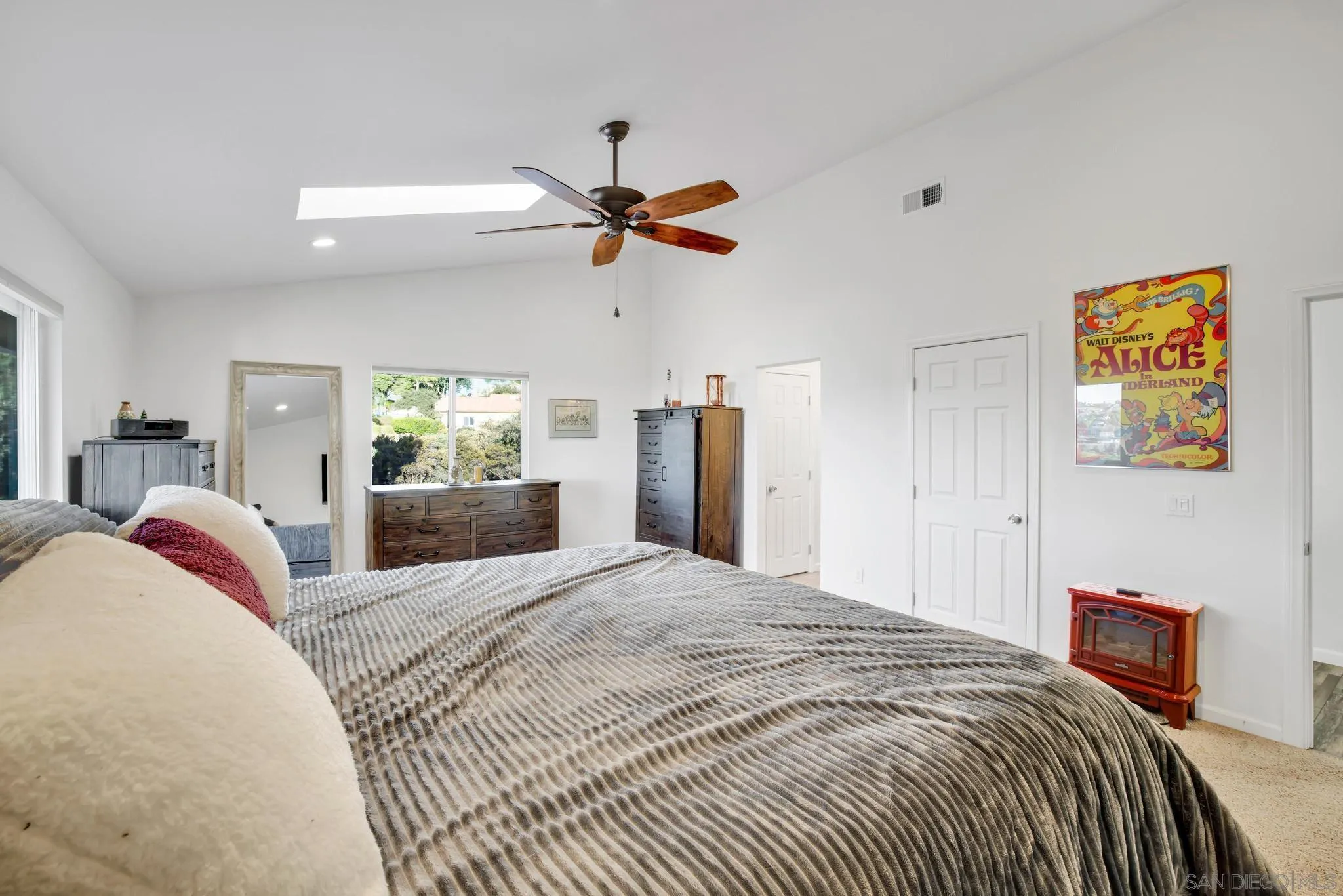 1661 West Winds Ridge Alpine, CA 91901 - Photo 33 of 65 a bedroom with a bed and a chandelier