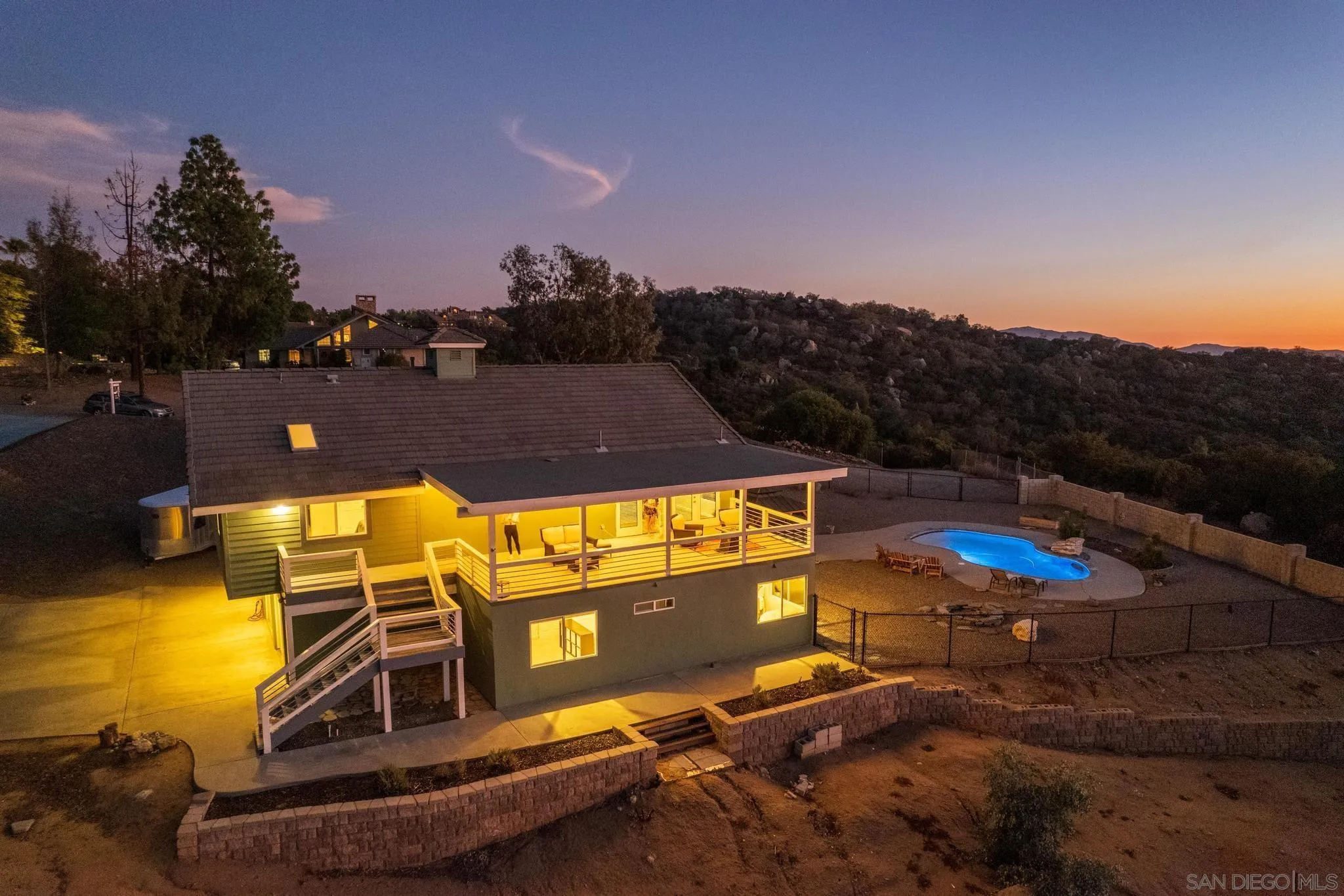 1661 West Winds Ridge Alpine, CA 91901 - Photo 42 of 65 a view of a swimming pool with an ocean and mountain view