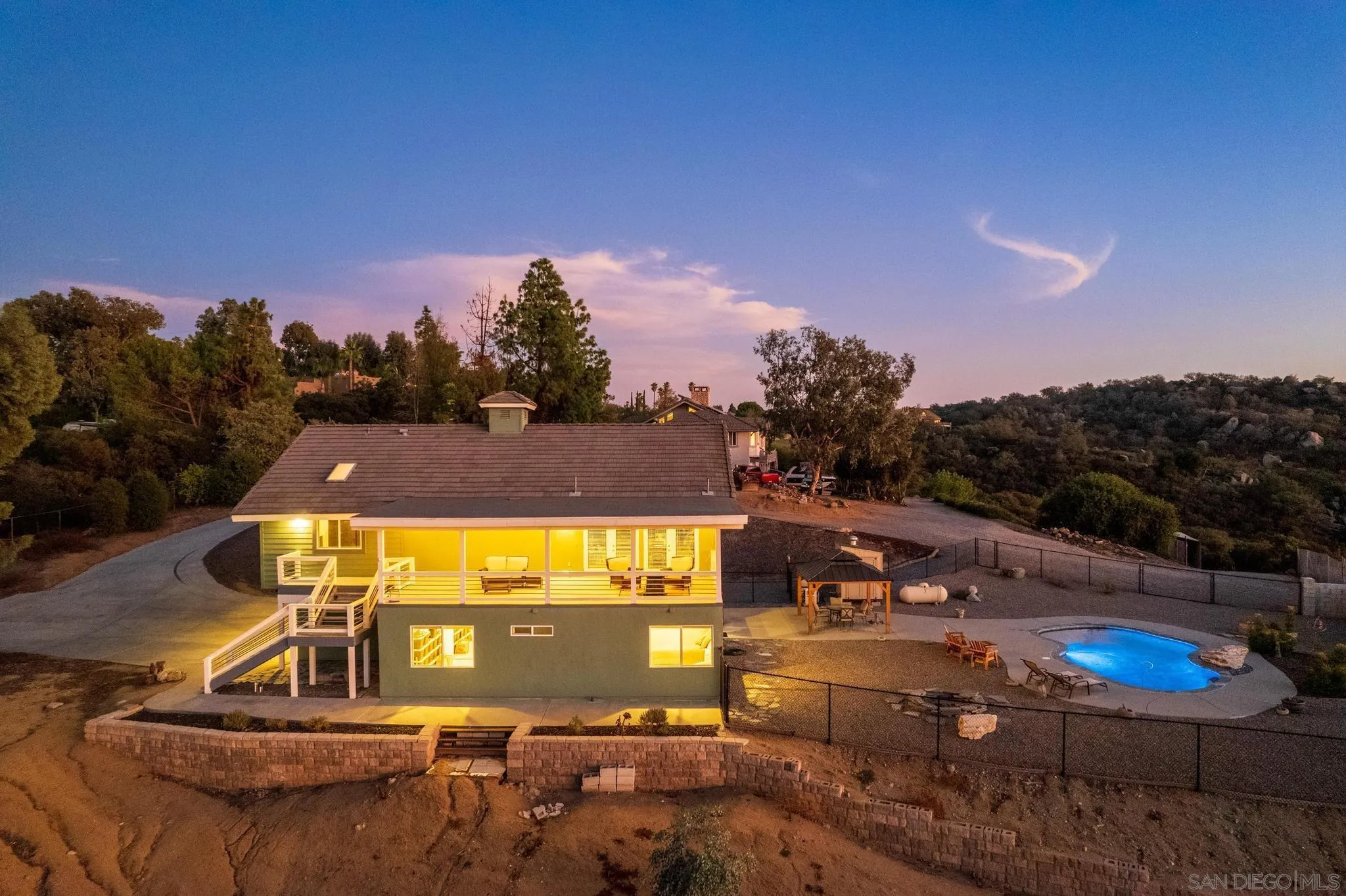 1661 West Winds Ridge Alpine, CA 91901 - Photo 43 of 65 a view of a swimming pool with a yard and mountain view