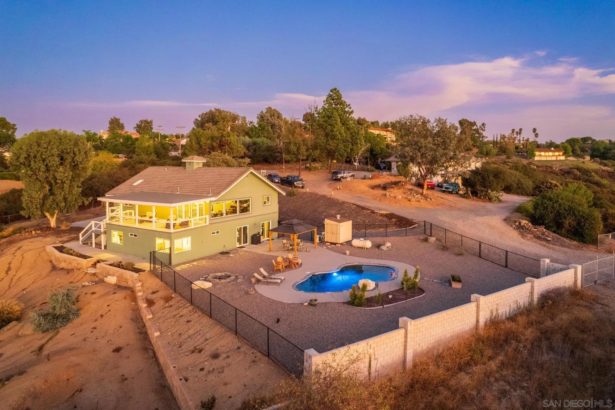 1661 West Winds Ridge Alpine, CA 91901 - Photo 56 of 65 a view of a swimming pool with a table and chairs