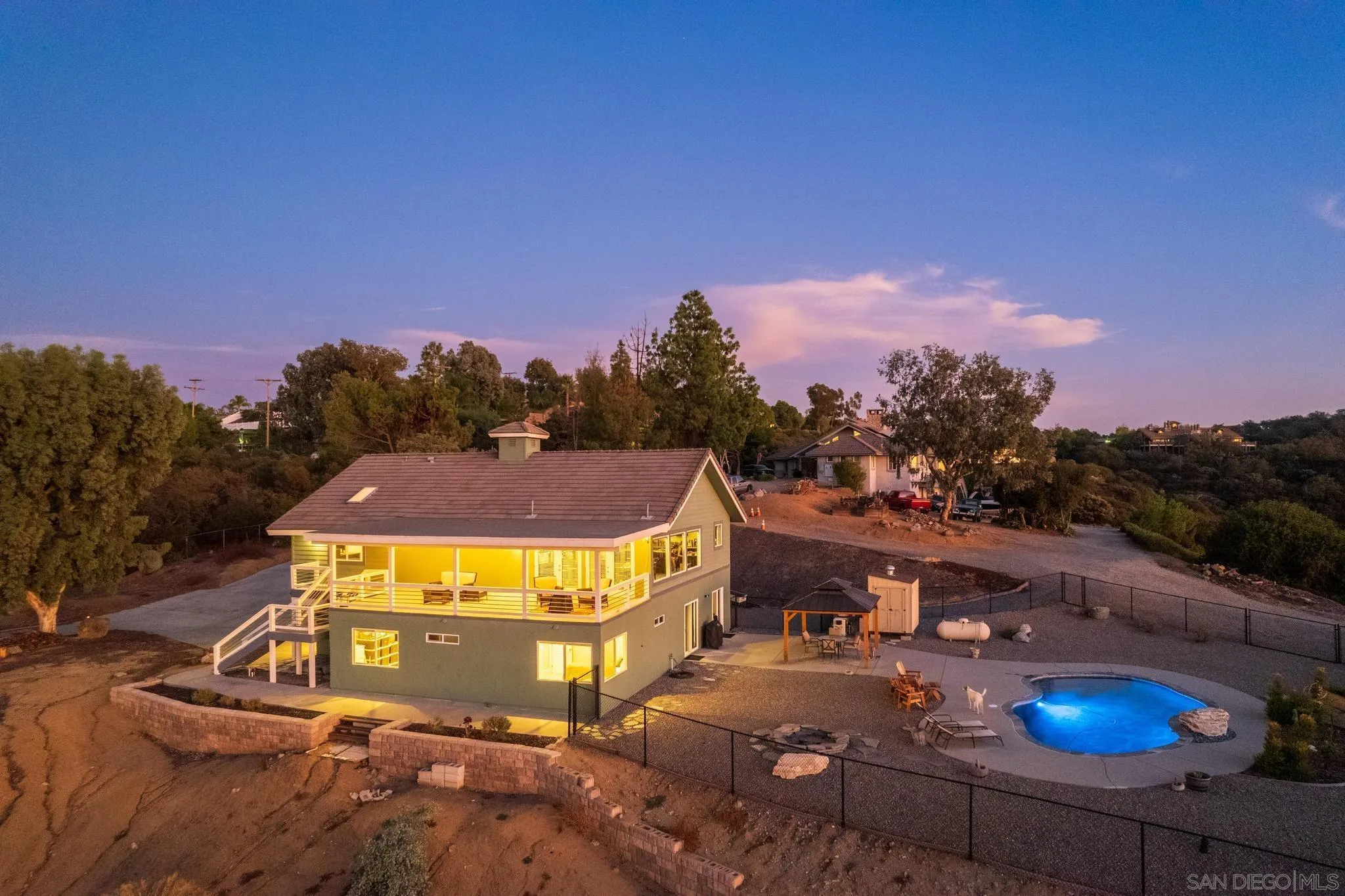 1661 West Winds Ridge Alpine, CA 91901 - Photo 59 of 65 a view of a swimming pool with a yard and mountain view