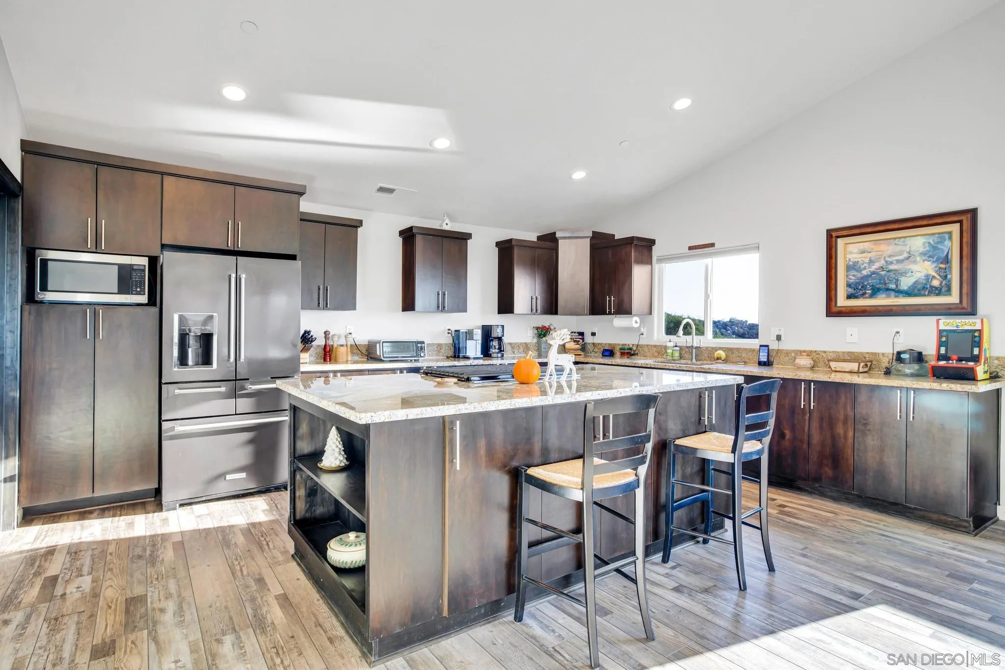 1661 West Winds Ridge Alpine, CA 91901 - Photo 6 of 65 a kitchen with a sink a counter top stainless steel appliances and cabinets