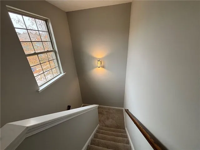 a view of livingroom with furniture and window