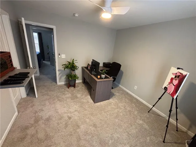 a room with furniture and a flat screen tv