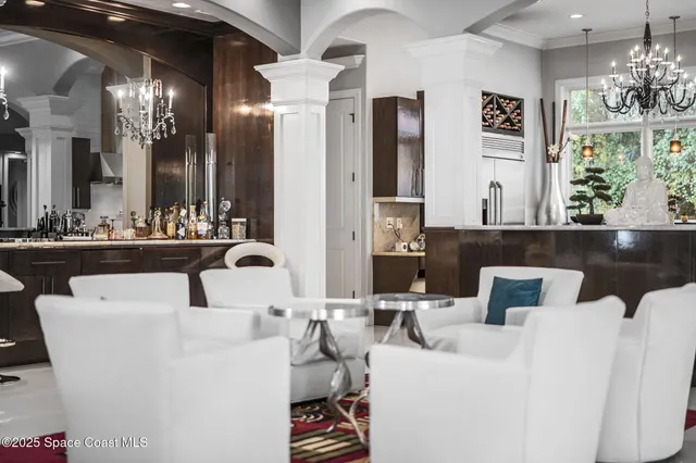 a view of walk in closet with clothes