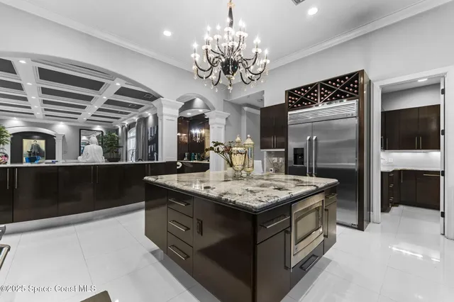 a bedroom with furniture and a flat screen tv