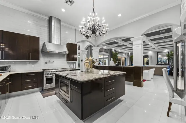 a view of a room with toys and wooden floor