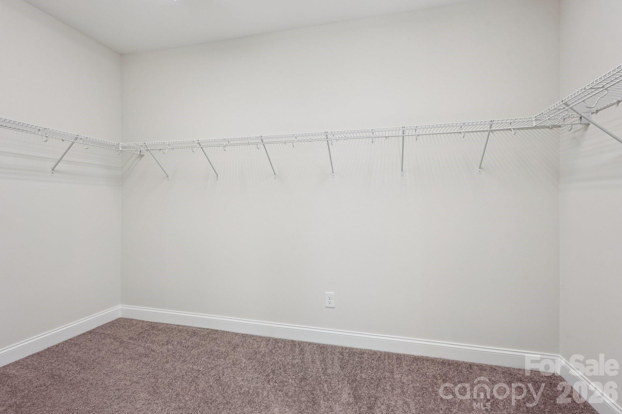 17422 Shearer Road Davidson, NC 28036 - Photo 21 of 48 a view of a room with racks on the wall