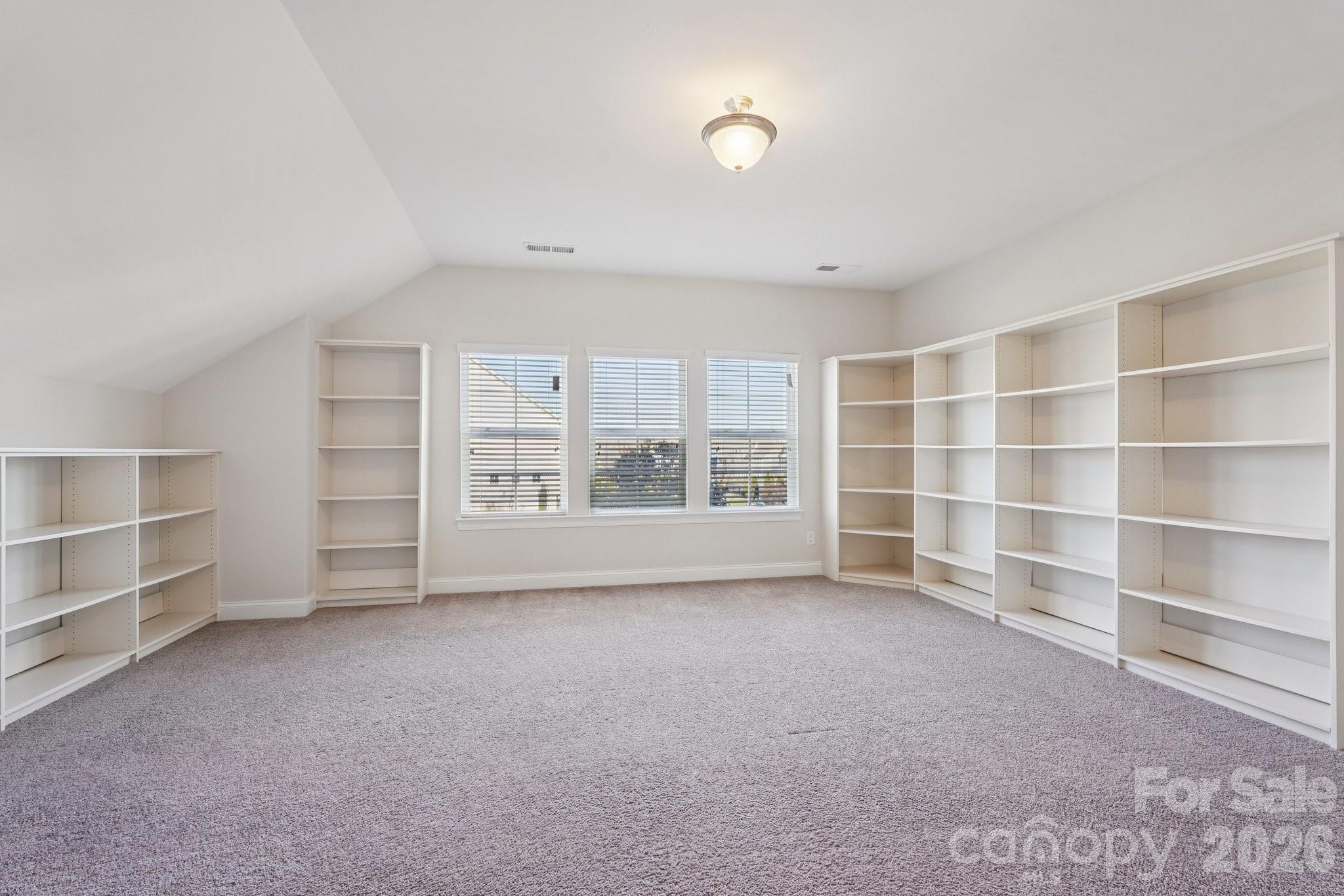 17422 Shearer Road Davidson, NC 28036 - Photo 29 of 48 a view of an empty room with a window