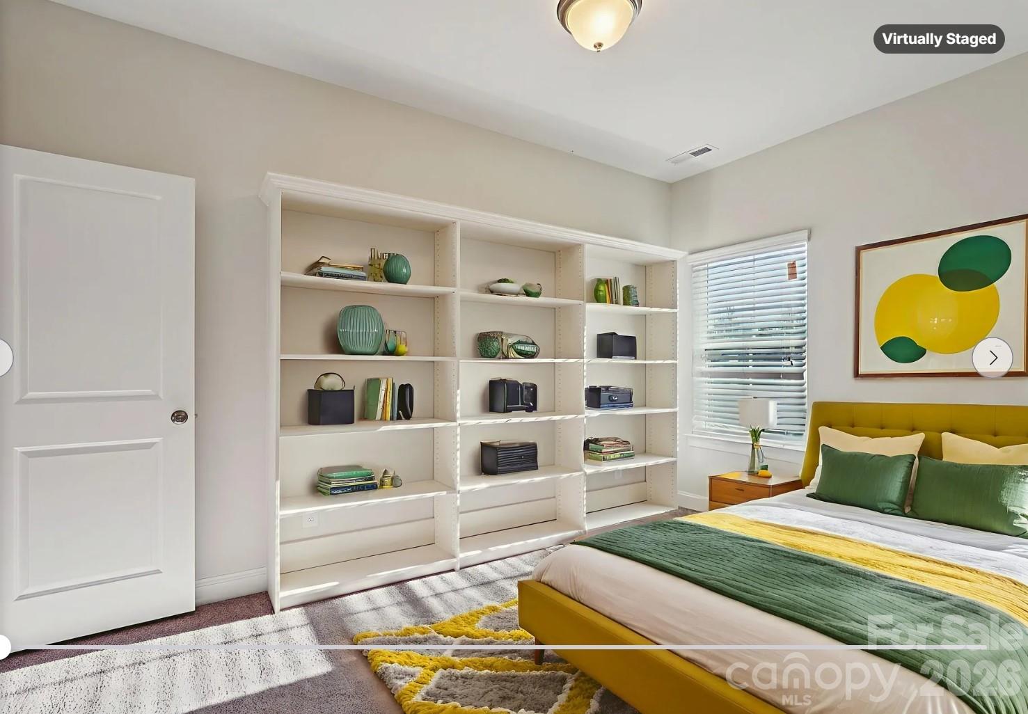 17422 Shearer Road Davidson, NC 28036 - Photo 35 of 48 a bedroom with a bed and cabinets