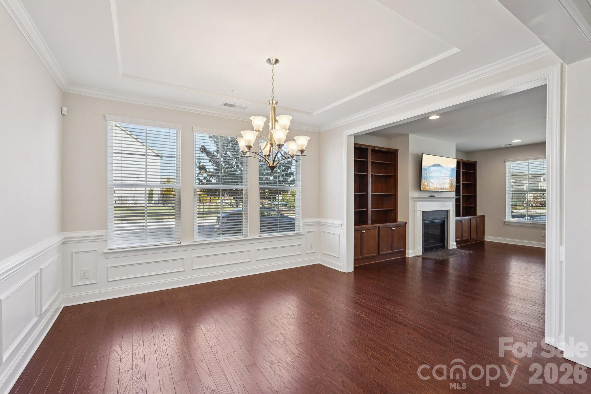 17422 Shearer Road Davidson, NC 28036 - Photo 8 of 48 a view of an empty room with wooden floor and a window
