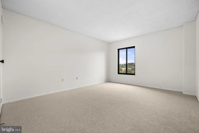 an empty room with window